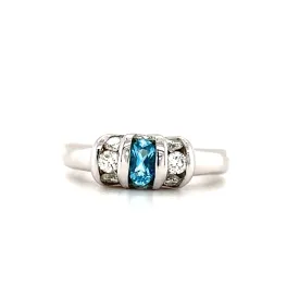 Oval Blue Topaz Ring with Side Diamonds in 14K White Gold